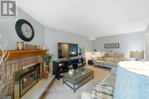 77 Lord Simcoe Drive, Brampton (Westgate), ON - Indoor Photo Showing Living Room With Fireplace