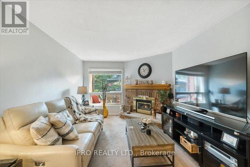 77 Lord Simcoe Drive, Brampton (Westgate), ON - Indoor Photo Showing Living Room With Fireplace