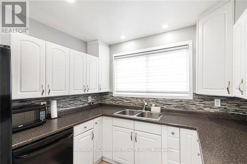 8 - 151 Berkindale Drive, Hamilton, ON - Indoor Photo Showing Kitchen With Double Sink
