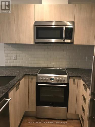 610 - 57 St Joseph Street, Toronto, ON - Indoor Photo Showing Kitchen