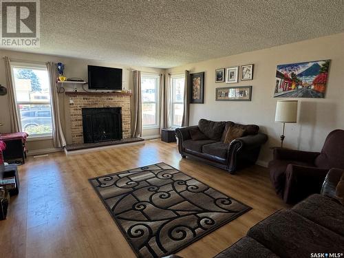 512 Gibson Street, La Ronge, SK - Indoor Photo Showing Living Room With Fireplace