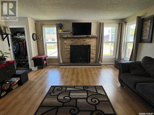 512 Gibson Street, La Ronge, SK - Indoor Photo Showing Living Room With Fireplace