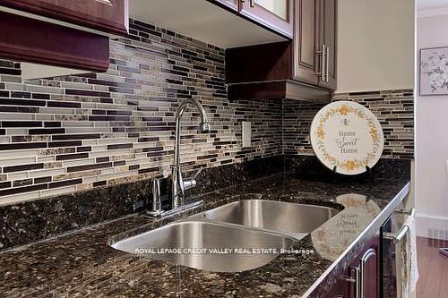 703-90 Ling Rd, Toronto, ON - Indoor Photo Showing Kitchen With Double Sink