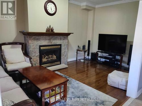 10 Olde Town Road, Brampton, ON - Indoor Photo Showing Living Room With Fireplace
