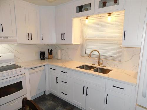 625 Tate Avenue, Hamilton, ON - Indoor Photo Showing Kitchen With Double Sink