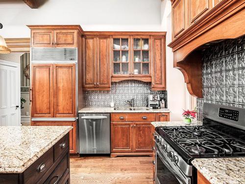 Cuisine - 338  - 342 Rue St-Eustache, Saint-Eustache, QC - Indoor Photo Showing Kitchen With Double Sink