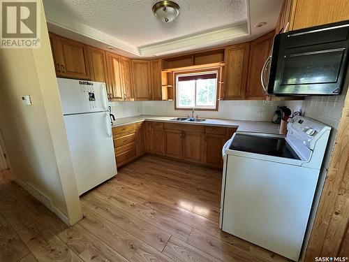 210 1St Street W, Meath Park, SK - Indoor Photo Showing Kitchen With Double Sink