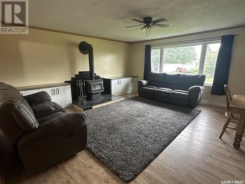 210 1St Street W, Meath Park, SK - Indoor Photo Showing Living Room With Fireplace