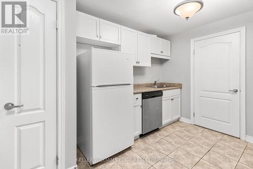 13 - 6350 Dorchester Road, Niagara Falls, ON - Indoor Photo Showing Kitchen With Double Sink