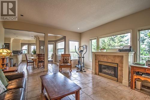 3780 Murray Drive, Armstrong, BC - Indoor Photo Showing Living Room With Fireplace