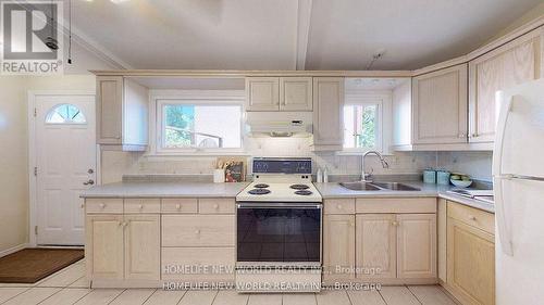 Upper - 22 Lisburn Crescent, Toronto, ON - Indoor Photo Showing Kitchen With Double Sink