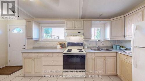 Upper - 22 Lisburn Crescent, Toronto (Don Valley Village), ON - Indoor Photo Showing Kitchen With Double Sink