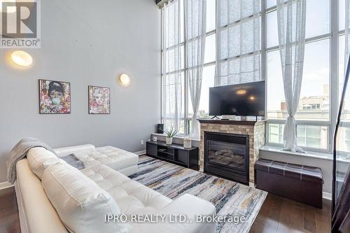 715 - 250 Manitoba Street, Toronto, ON - Indoor With Fireplace