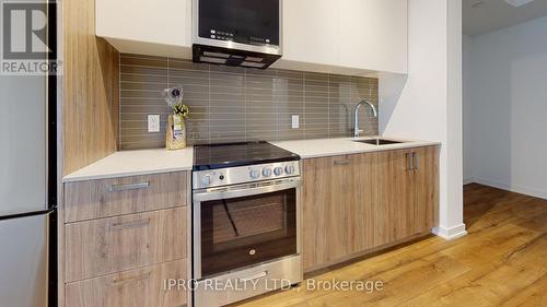 414 - 1787 St. Clair Avenue W, Toronto, ON - Indoor Photo Showing Kitchen With Upgraded Kitchen