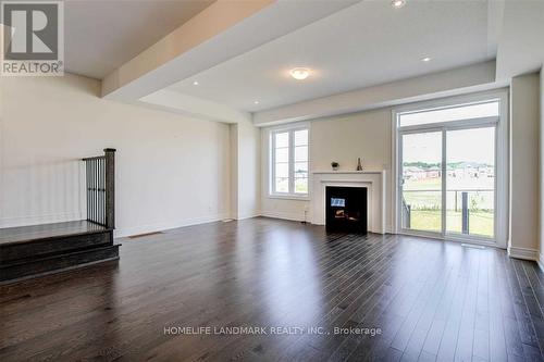 100 Christine Elliot Avenue, Whitby, ON - Indoor Photo Showing Living Room With Fireplace
