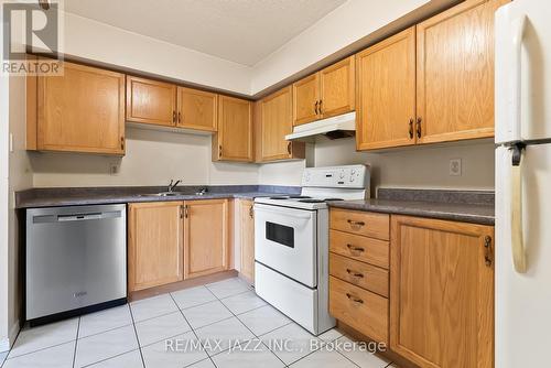 506 - 454 Centre Street S, Oshawa, ON - Indoor Photo Showing Kitchen With Double Sink