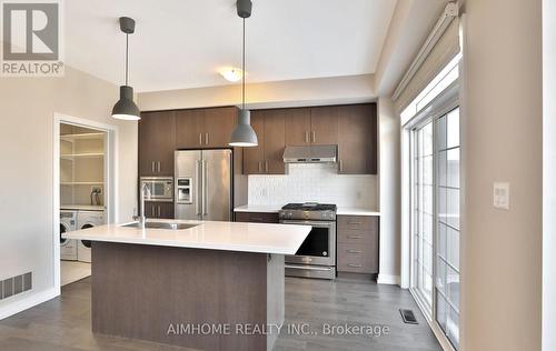 18 - 3026 Postridge Drive, Oakville, ON - Indoor Photo Showing Kitchen With Stainless Steel Kitchen With Upgraded Kitchen