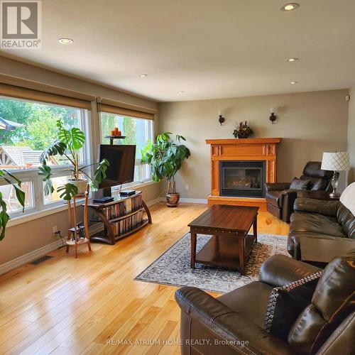 825 Southview Drive, Otonabee-South Monaghan, ON - Indoor Photo Showing Living Room With Fireplace