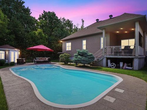 Back facade - 184 Rue De Miramas, Terrebonne (Terrebonne), QC - Outdoor With In Ground Pool With Backyard