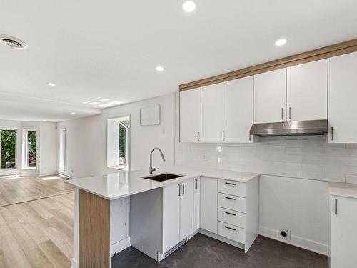 Cuisine - 68 Rue Félix-Antoine-Savard, Blainville, QC - Indoor Photo Showing Kitchen With Upgraded Kitchen