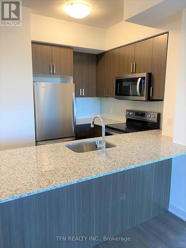 320 - 1603 Eglinton Avenue W, Toronto, ON - Indoor Photo Showing Kitchen With Double Sink