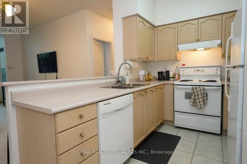 101 - 2565 Erin Centre Boulevard, Mississauga, ON - Indoor Photo Showing Kitchen With Double Sink