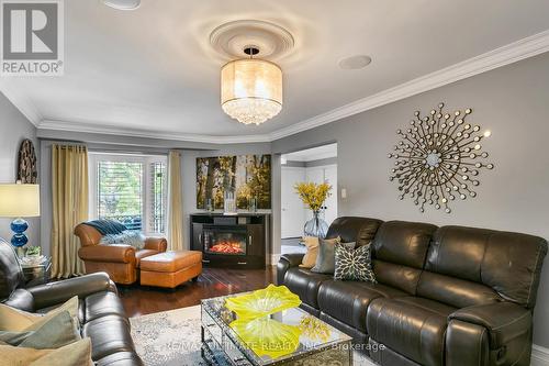 77 Morningview Trail, Toronto, ON - Indoor Photo Showing Living Room With Fireplace