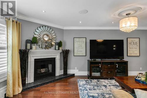 77 Morningview Trail, Toronto, ON - Indoor Photo Showing Living Room With Fireplace