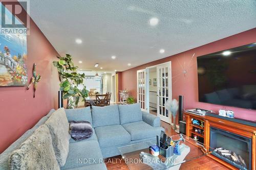 18 Girdwood Drive, Barrie, ON - Indoor Photo Showing Living Room With Fireplace