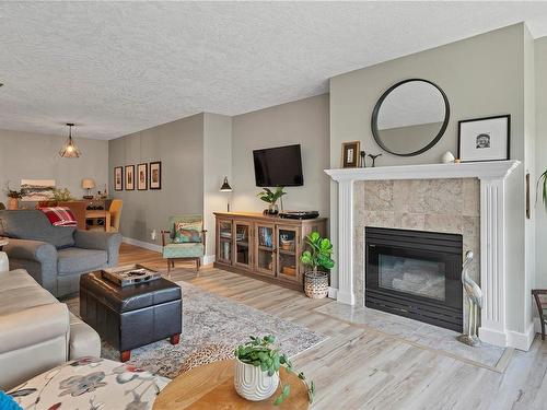 306-9 Adams Rd, Campbell River, BC - Indoor Photo Showing Living Room With Fireplace