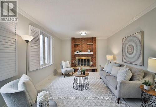 16 Mansfield Crescent, Whitby, ON - Indoor Photo Showing Living Room With Fireplace