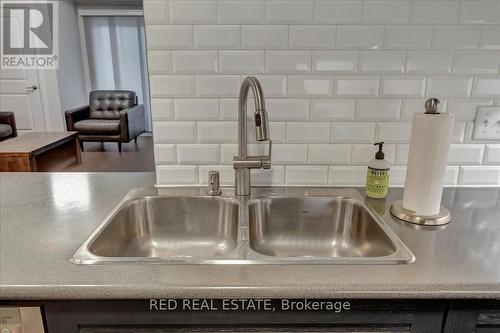 212 - 720 Yonge Street, Barrie, ON - Indoor Photo Showing Kitchen With Double Sink
