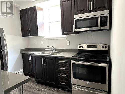 1 - 6 Seventeenth Street, Toronto, ON - Indoor Photo Showing Kitchen With Stainless Steel Kitchen With Double Sink