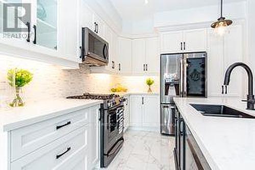 42 St Augustine Drive, Whitby (Brooklin), ON - Indoor Photo Showing Kitchen With Upgraded Kitchen