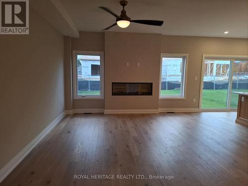 42 St Augustine Drive, Whitby, ON - Indoor Photo Showing Living Room With Fireplace