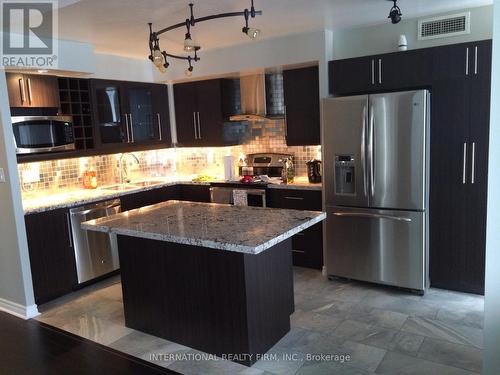 2206 - 3880 Duke Of York Boulevard, Mississauga, ON - Indoor Photo Showing Kitchen With Double Sink With Upgraded Kitchen