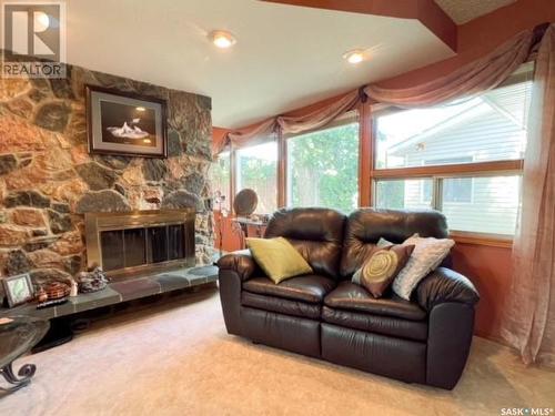 1109 Bothwell Drive, Swift Current, SK - Indoor Photo Showing Living Room With Fireplace
