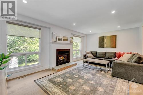 82 Gladecrest Court, Ottawa, ON - Indoor Photo Showing Living Room With Fireplace