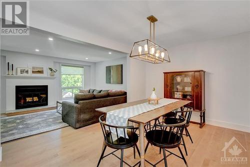 82 Gladecrest Court, Ottawa, ON - Indoor Photo Showing Dining Room With Fireplace