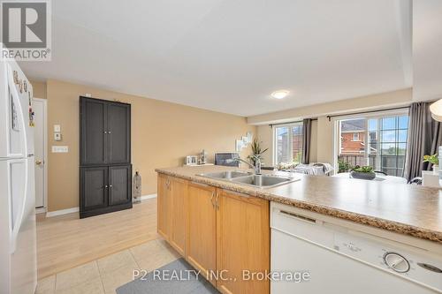 6 - 145 Isaac Devins Boulevard, Toronto, ON - Indoor Photo Showing Kitchen With Double Sink