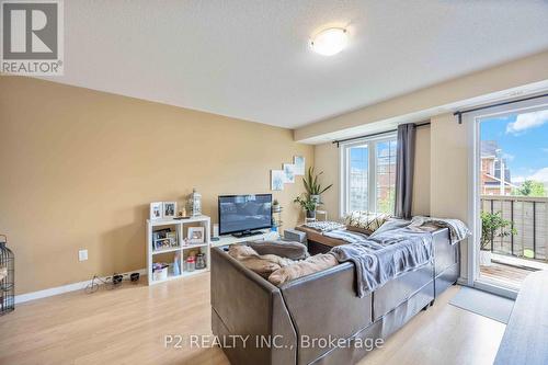 6 - 145 Isaac Devins Boulevard, Toronto, ON - Indoor Photo Showing Living Room