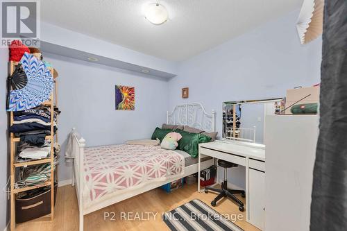 6 - 145 Isaac Devins Boulevard, Toronto, ON - Indoor Photo Showing Bedroom
