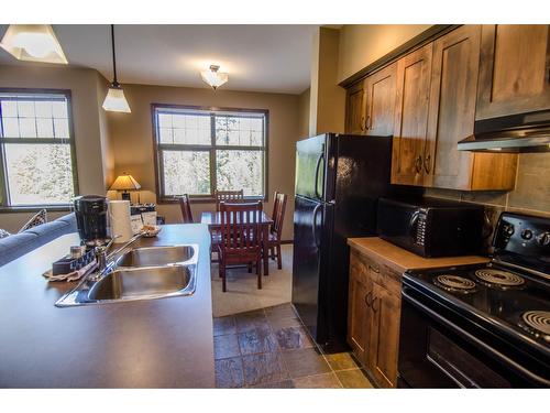 111 - 1545 Kicking Horse Trail, Golden, BC - Indoor Photo Showing Kitchen With Double Sink