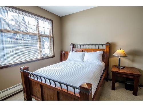 111 - 1545 Kicking Horse Trail, Golden, BC - Indoor Photo Showing Bedroom