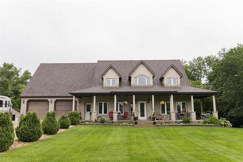 85 Heritage Drive, Dufferin, MB - Outdoor With Deck Patio Veranda With Facade