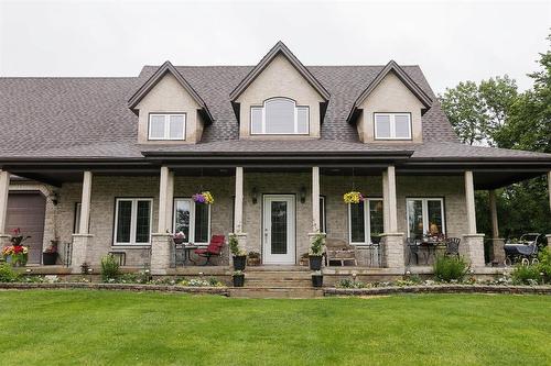 85 Heritage Drive, Dufferin, MB - Outdoor With Deck Patio Veranda With Facade