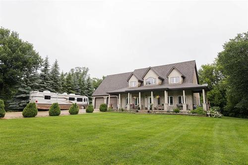 85 Heritage Drive, Dufferin, MB - Outdoor With Deck Patio Veranda With Facade