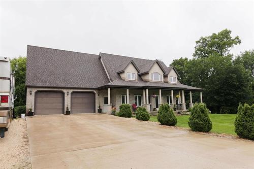 85 Heritage Drive, Dufferin, MB - Outdoor With Deck Patio Veranda With Facade