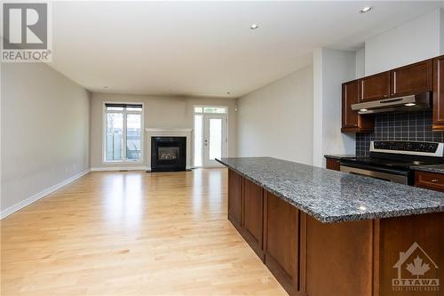 141 Manorhill Private, Ottawa, ON - Indoor With Fireplace