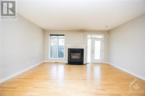 141 Manorhill Private, Ottawa, ON - Indoor Photo Showing Living Room With Fireplace